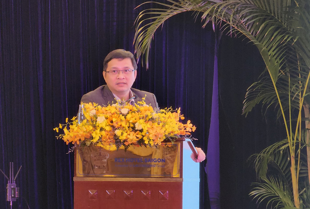 Ông Lâm Nguyễn Hải Long – Giám đốc QTSC trình bày tham luận tại hội thảo