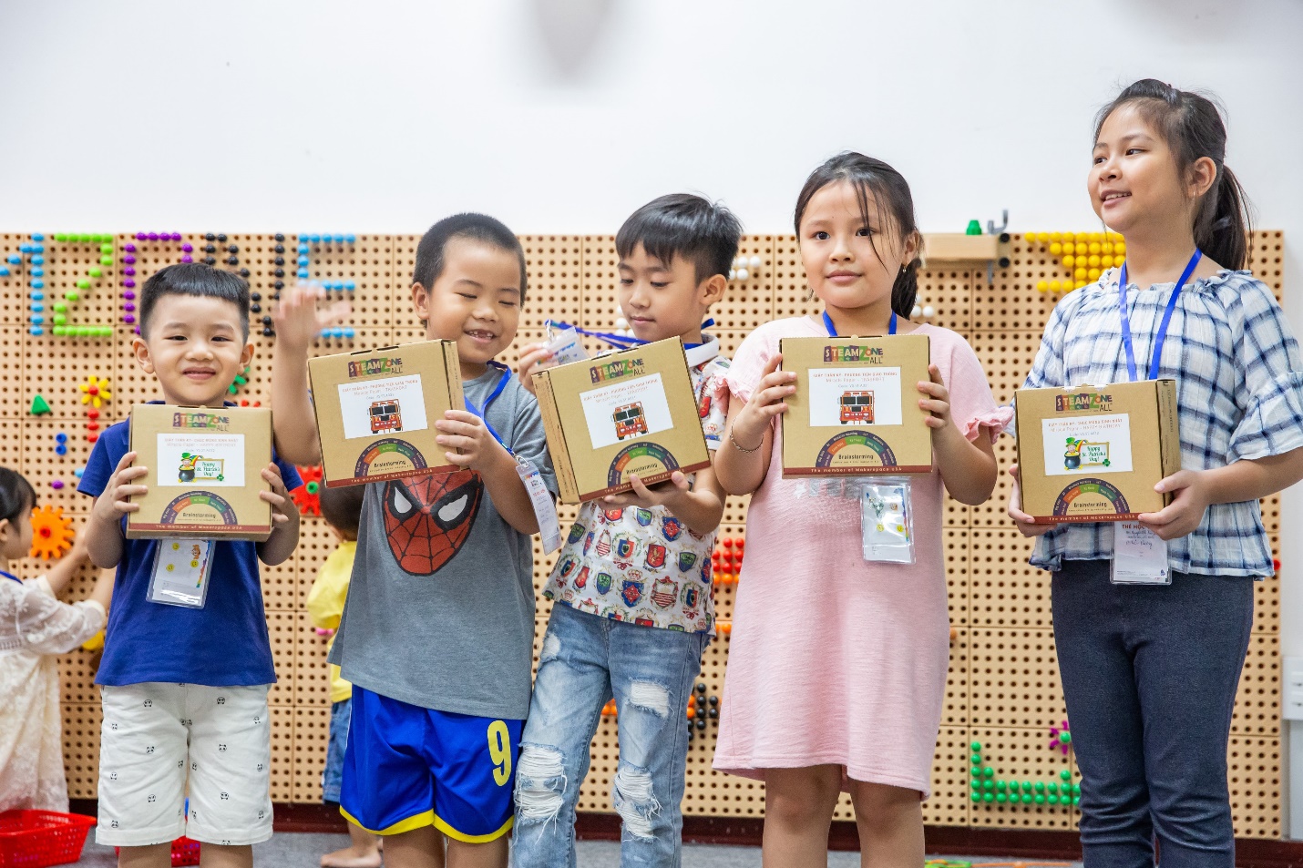 These kids collected 3 stickers were received gifts from the center