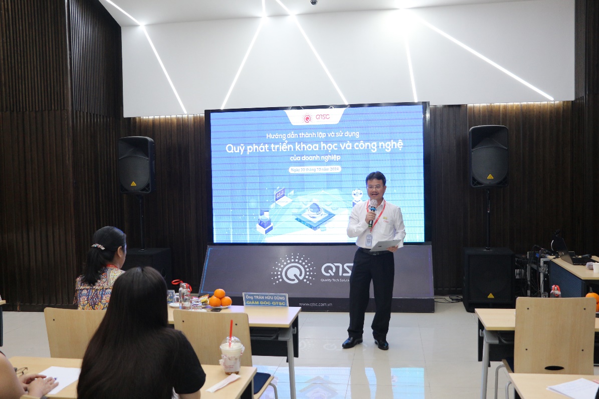 Mr. Tran Huu Dung, CEO of QTSC, giving the opening remarks