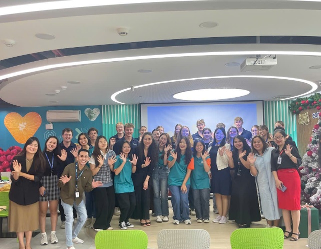 The group attended a sharing session with representatives from Concentrix and posed for group photos
